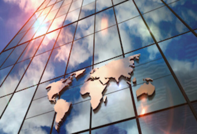 World Map sign on glass skyscraper with mirrored sky illustration