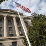 Department of Justice Building and American Flag