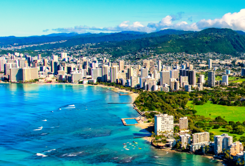 Aerial View of Blue Water, Cityscape and Coastline in Hawaii.