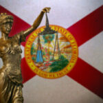 lady justice and Florida state flag